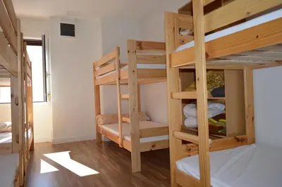 Cama o camas de una habitación en Albergue Gares