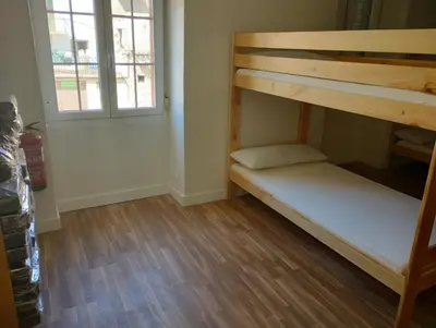 Cama o camas de una habitación en Albergue Gares