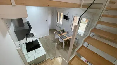 Una televisión o centro de entretenimiento en APARTAMENTOS AREKORATAS 255 y 256