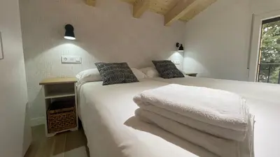 Cama o camas de una habitación en APARTAMENTOS AREKORATAS 255 y 256