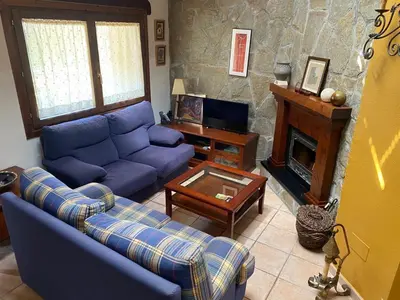 Una televisión o centro de entretenimiento en Casa Belius