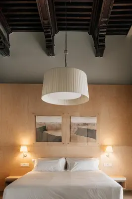 Cama o camas de una habitación en Hotel Santa Ana Tudela