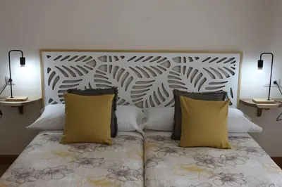 Cama o camas de una habitación en Apartamento Turístico HB