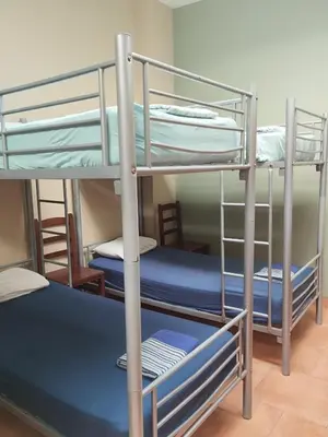 Cama o camas de una habitación en Albergue Kortarixar