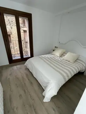 Cama o camas de una habitación en CASA CON ENCANTO ESTERRI