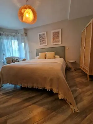 Cama o camas de una habitación en Tuca - Cozy Duplex with Private Parking Betren - Vielha