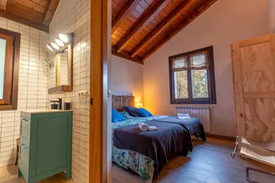 Cama o camas de una habitación en Arpetxea casa rural