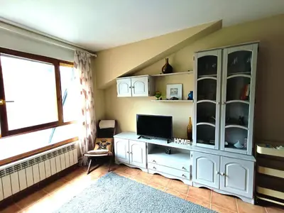 Una televisión o centro de entretenimiento en Apartamento con encanto