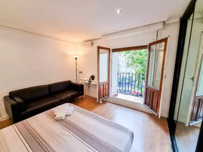 Cama o camas de una habitación en Casa de Goya Turistea Suites