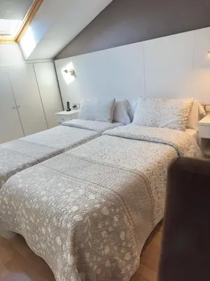 Cama o camas de una habitación en Hotel El Acebo