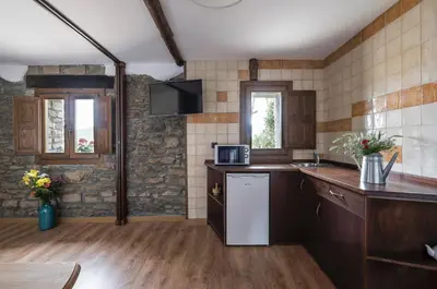 Una cocina o zona de cocina en La Borda de Pastores