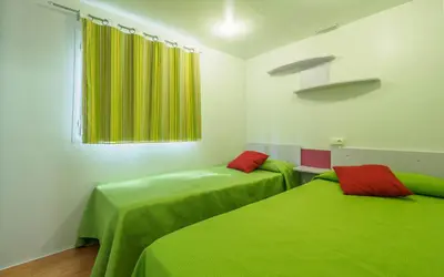 Cama o camas de una habitación en Camping Alberg Municipal Tivissa