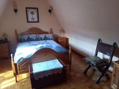 Cama o camas de una habitación en Ático en pleno pirineo