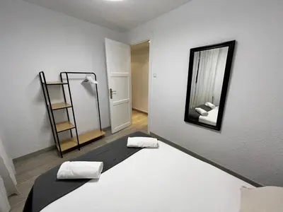Cama o camas de una habitación en Apartamenticos La Paz I