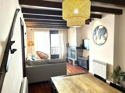 Zona de estar de Apartament lluminós amb encant by RURAL D'ÀNEU