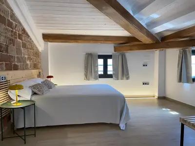 Cama o camas de una habitación en ROS CENTRIC Cal Ros