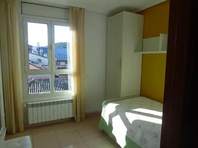 Cama o camas de una habitación en Apartamentos Edificio Aguilas