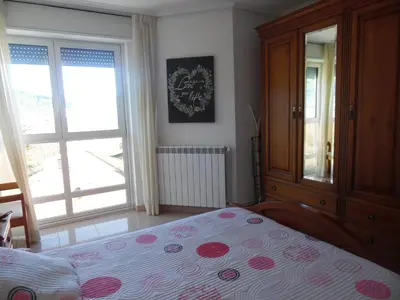 Cama o camas de una habitación en Apartamentos Edificio Aguilas