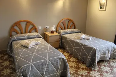 Cama o camas de una habitación en Casa Rural LA COSTANILLA