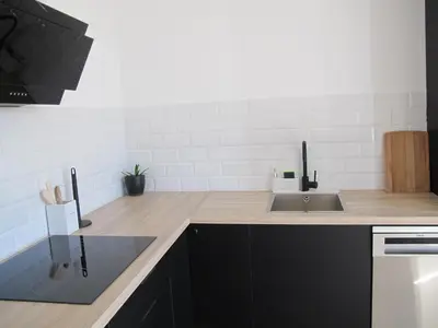 Una cocina o zona de cocina en Apartamento grande en Huesca