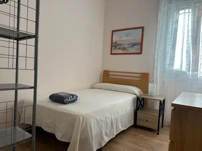 Cama o camas de una habitación en Dos Torres Tenor Gayarre - Encanto con Balcón Interior