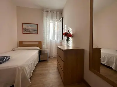 Cama o camas de una habitación en Dos Torres Tenor Gayarre - Encanto con Balcón Interior