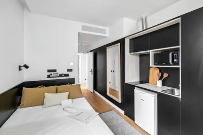 Cama o camas de una habitación en Home and CoLiving Pamplona