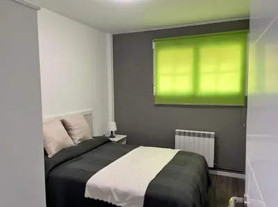 Cama o camas de una habitación en La Posada de Luismi