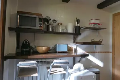Una cocina o zona de cocina en Piso Acogedor de Montaña con Terraza