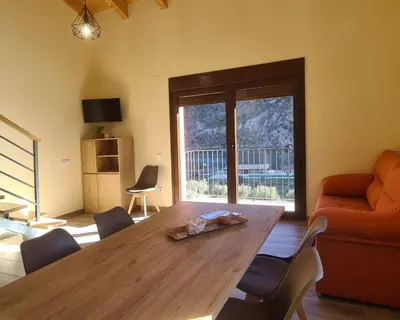 Zona de estar de Apartamentos La Era de Pasé