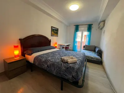 Cama o camas de una habitación en ZARAGOZA CENTRAL APARTMENT