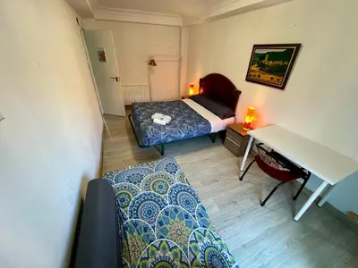 Cama o camas de una habitación en ZARAGOZA CENTRAL APARTMENT
