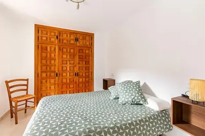 Cama o camas de una habitación en Casa Luis - APARTAMENTO con JARDÍN PRIVADO en los PIRINEOS