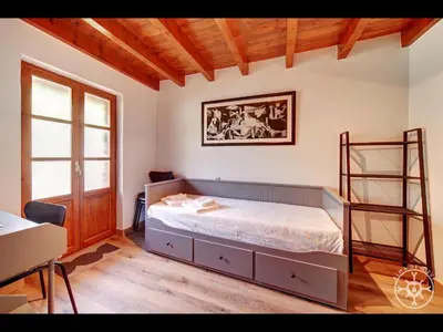 Cama o camas de una habitación en CASA DEL VALLE de Alma de Nieve