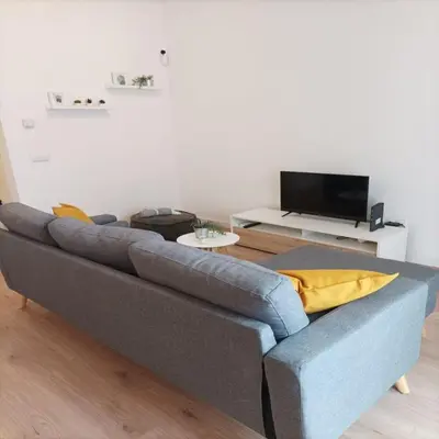 Una televisión o centro de entretenimiento en NUEVO Apartamento Centro Lleida