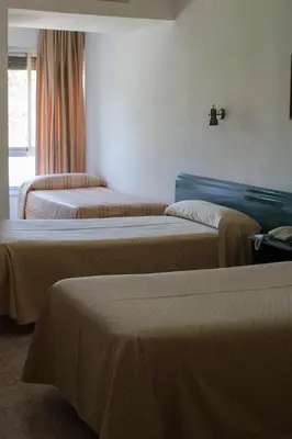 Cama o camas de una habitación en Hotel Pepa