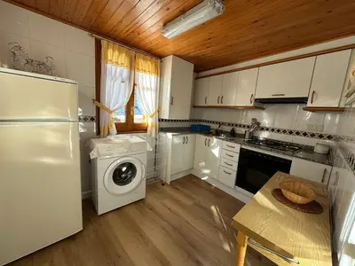 Una cocina o zona de cocina en Apartament Casa Sastre