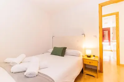 Cama o camas de una habitación en Los Pinos, acogedor apartamento con garaje - Arafita Apartamentos