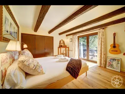 Cama o camas de una habitación en CASA SANT BLAS de Alma de Nieve