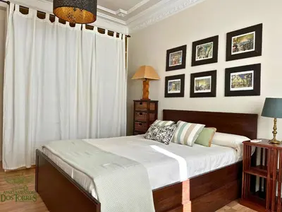 Cama o camas de una habitación en Dos Torres Valinor - Plaza del Pilar