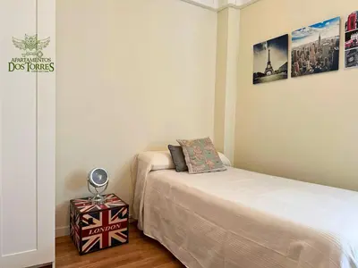 Cama o camas de una habitación en Dos Torres Valinor - Plaza del Pilar