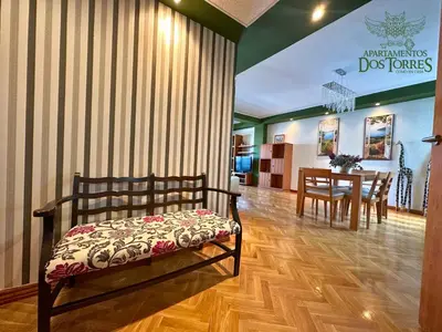 Cama o camas de una habitación en Dos Torres Ático - Solárium Privado en Calle Alfonso I