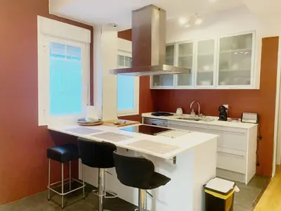 Una cocina o zona de cocina en Un hogar en el centro con parking gratuito