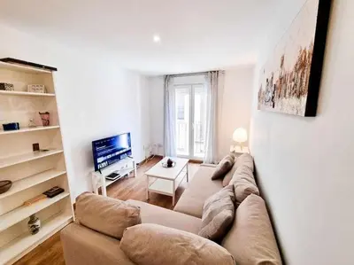 Una televisión o centro de entretenimiento en Temple del Pilar ComoTuCasa