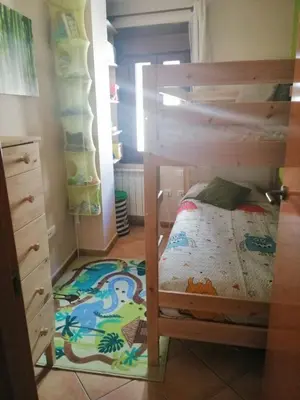 Cama o camas de una habitación en Acogedor apartamento dúplex Sandiniés