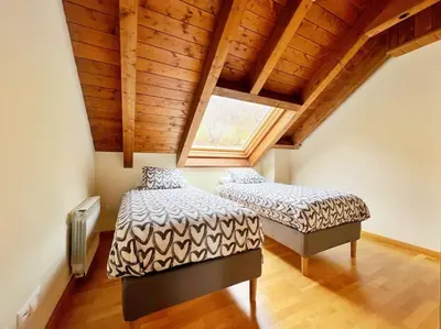 Cama o camas de una habitación en Ático turistico en Durro - La Vall de Boí