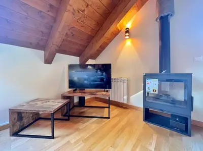 Una televisión o centro de entretenimiento en Ático turistico en Durro - La Vall de Boí