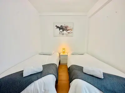 Cama o camas de una habitación en La Ibiza del Pilar