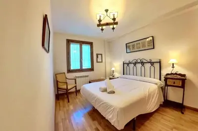 Cama o camas de una habitación en Sarriales II tucasaenlospirineos