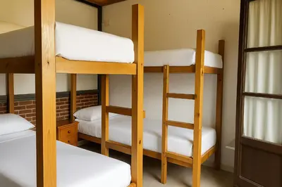 Cama o camas de una habitación en Albergue Tritón - Villanúa